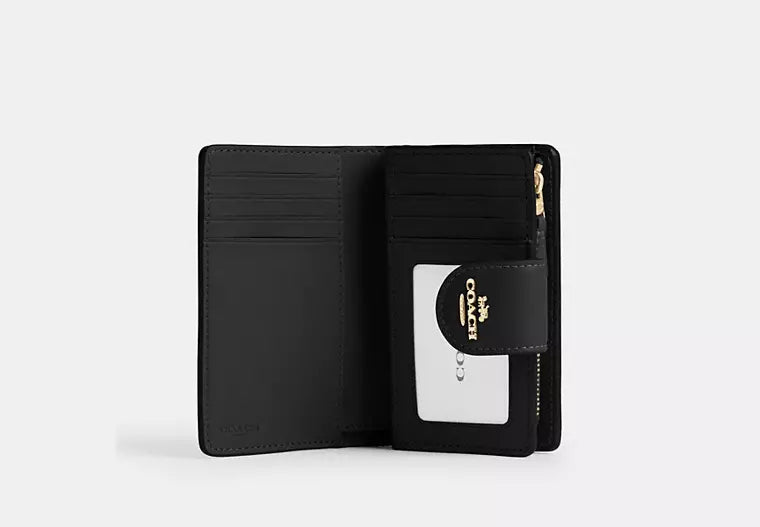 Billetera mediana Coach